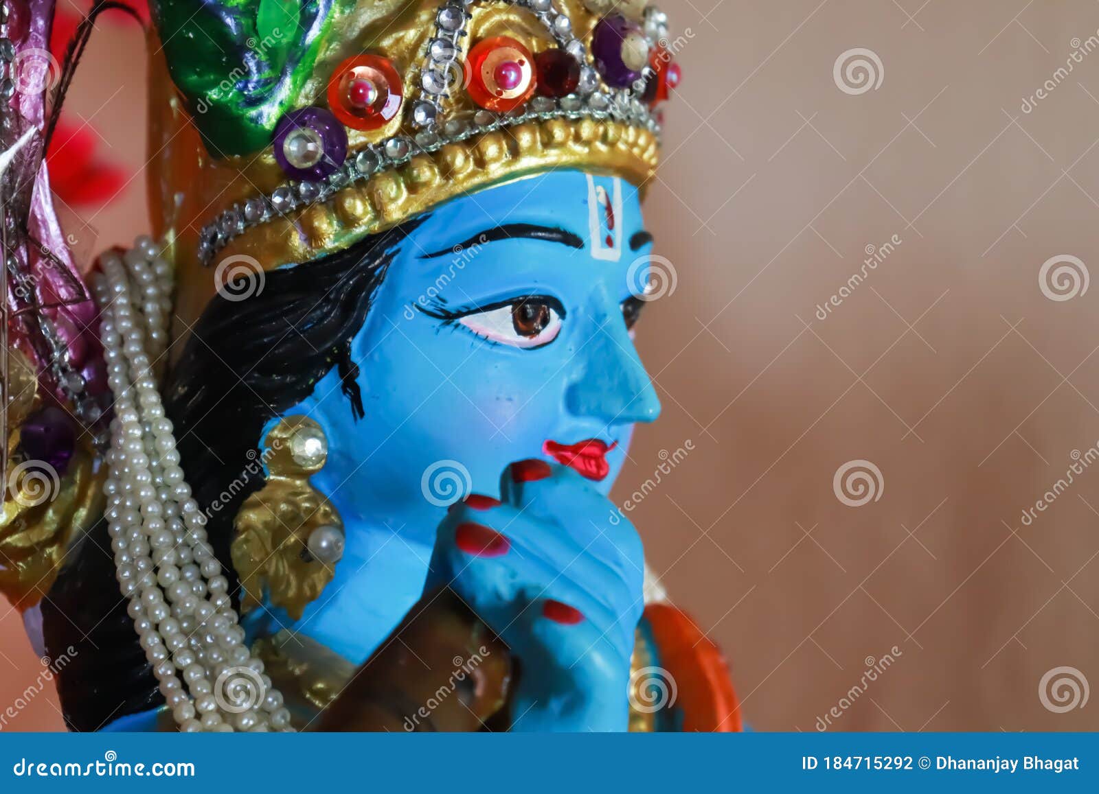Closeup of Lord Krishna Playing Flute Stock Photo - Image of eyes ...
