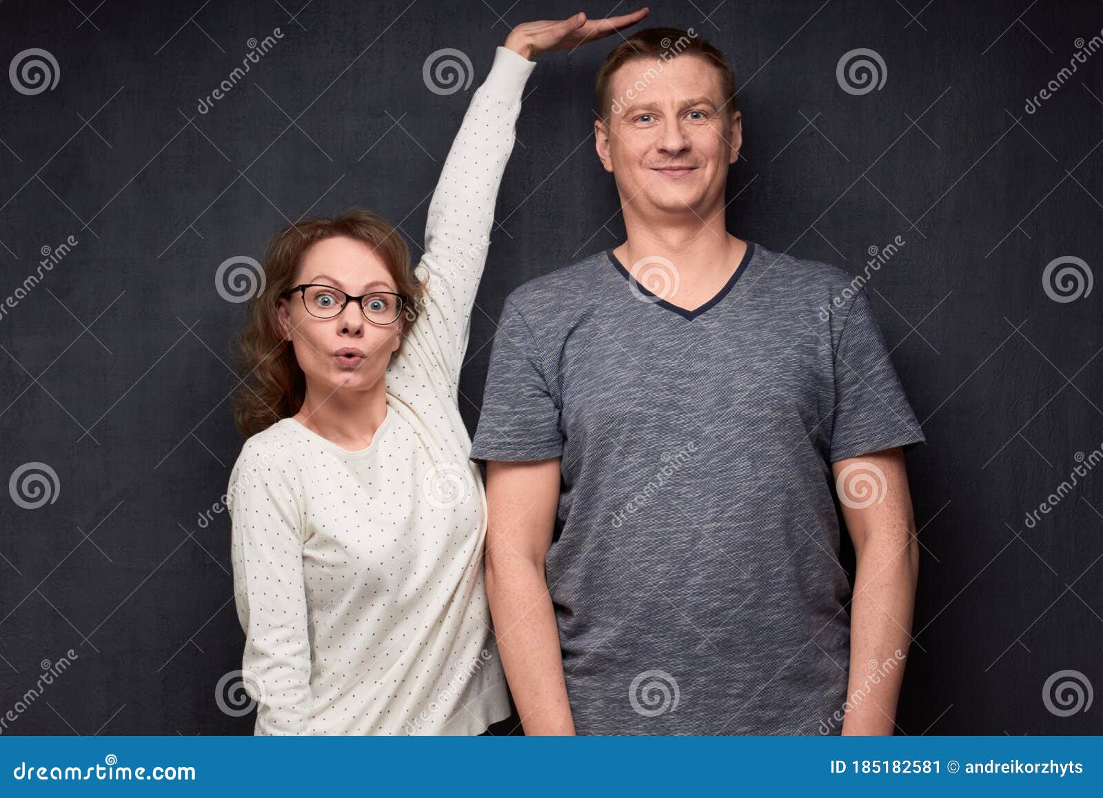 shot of funny short woman and tall man