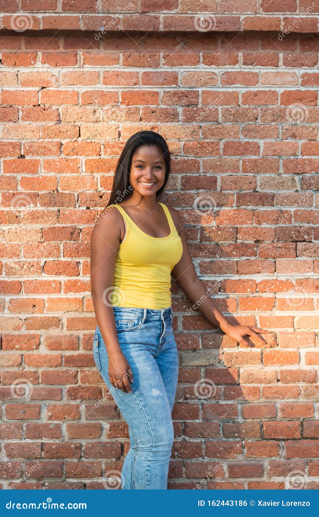 https://thumbs.dreamstime.com/z/shot-pretty-young-latin-woman-looking-camera-street-162443186.jpg