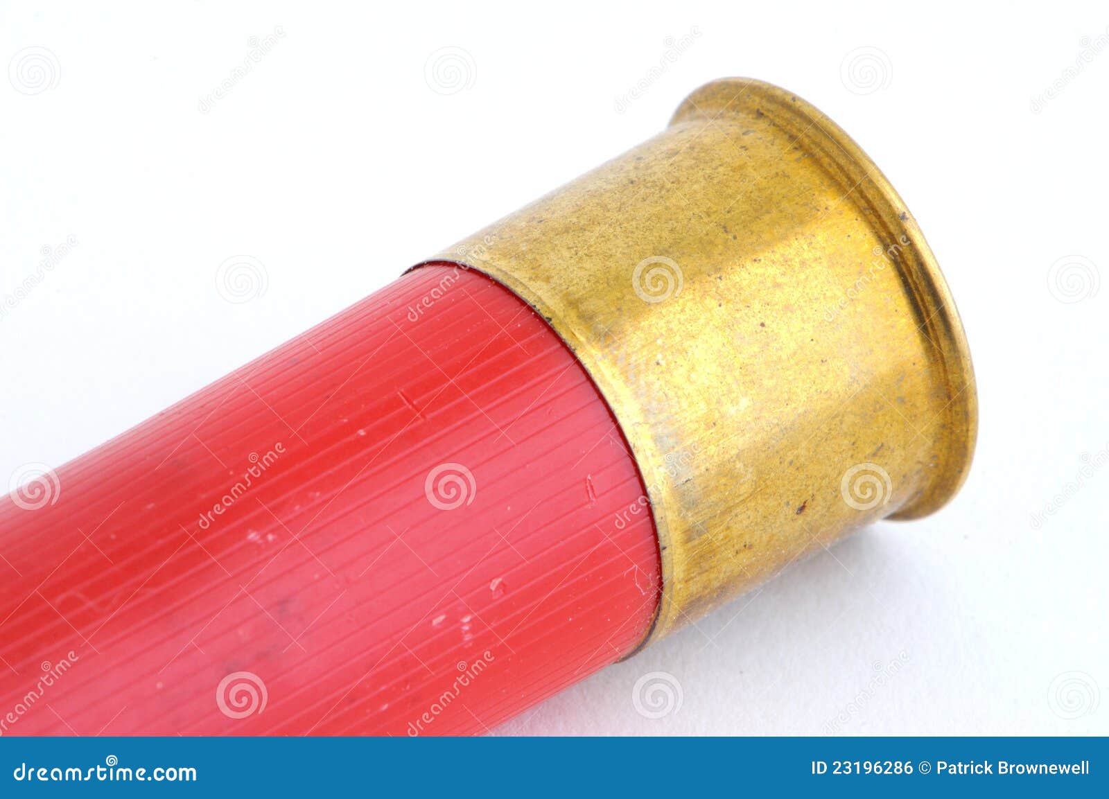 Shotgun shell brass red stock photo. Image of brass, casing - 23196286