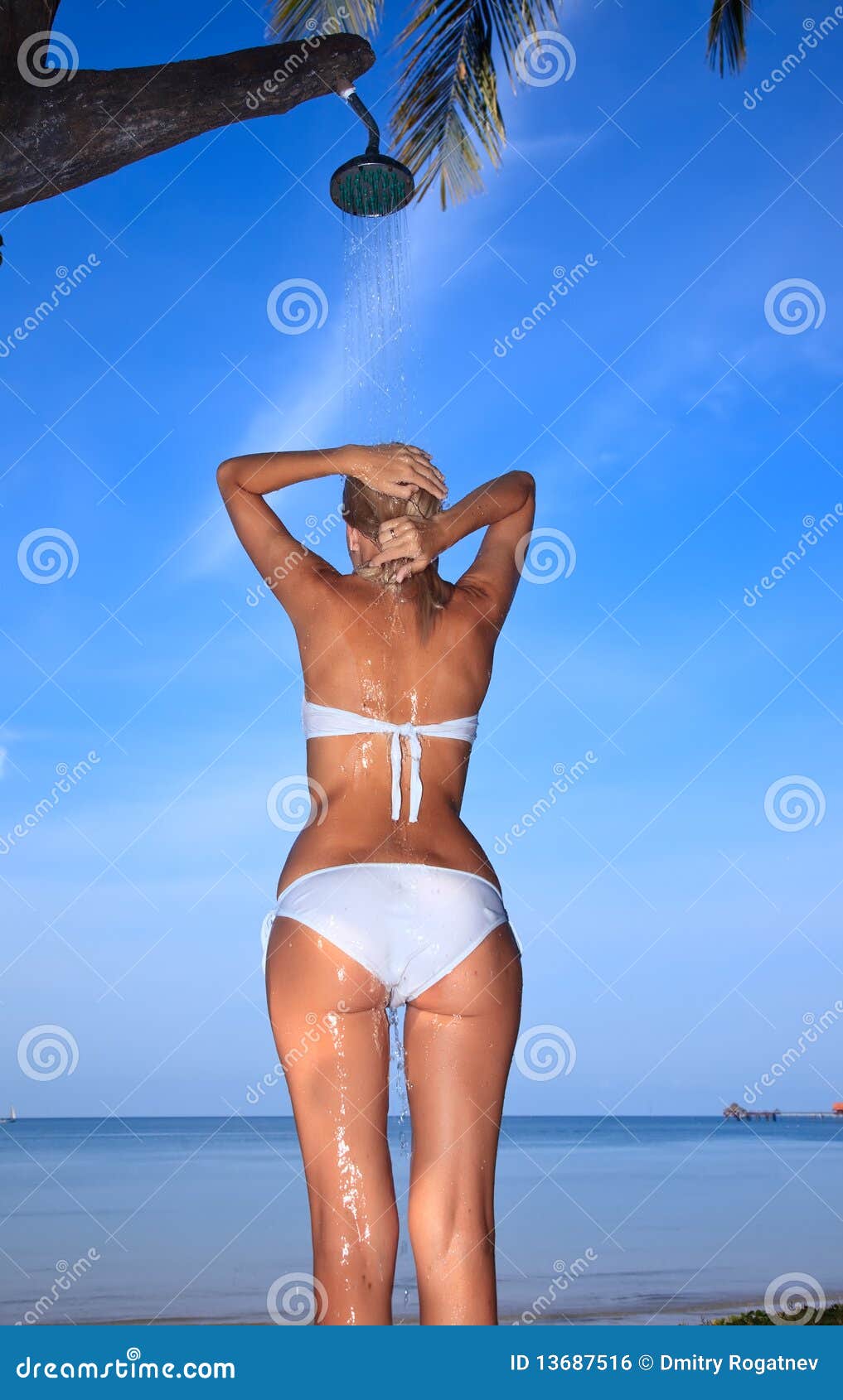 Shower on the beach stock photo. Image of holiday, outdoor 13687516