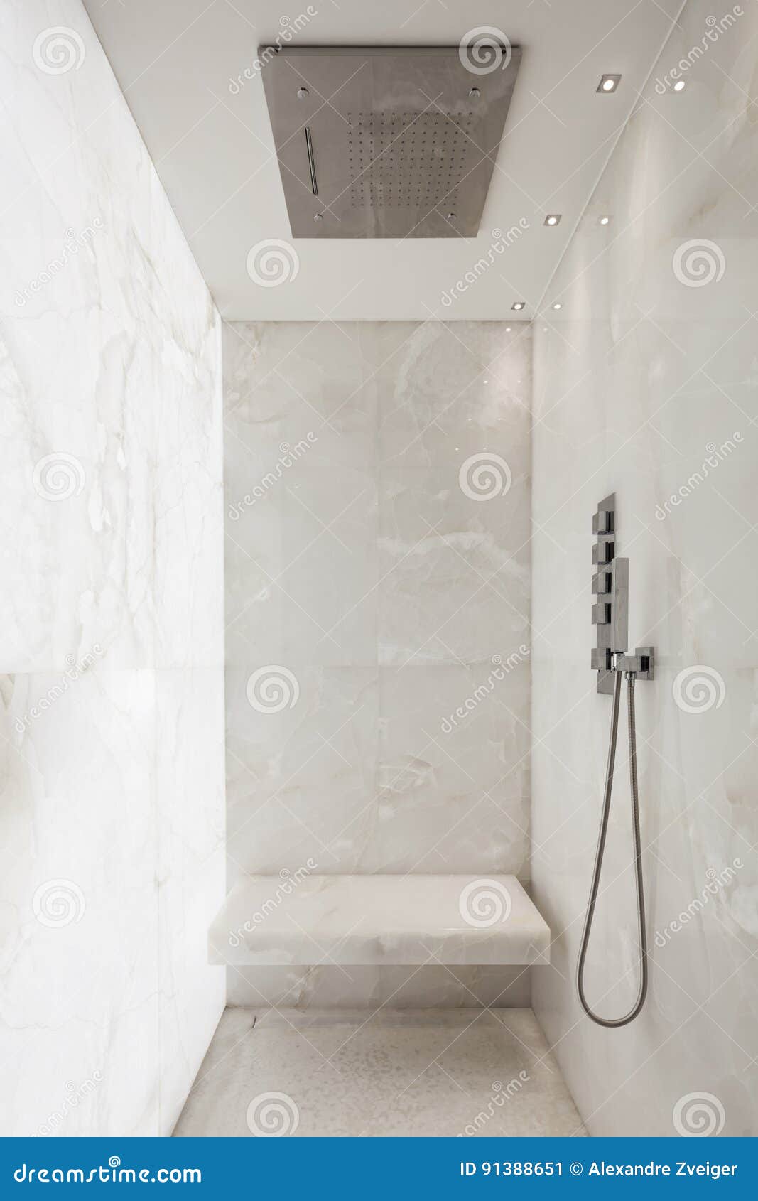 shower covered in white marble, 