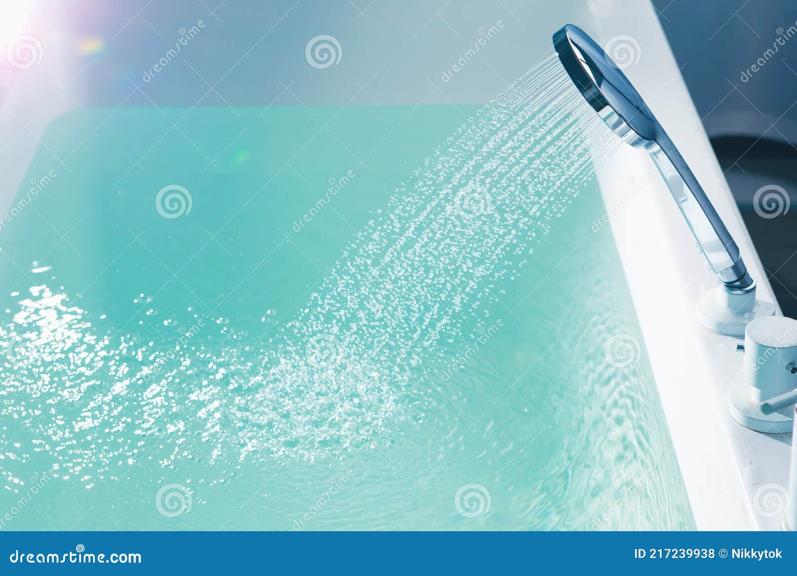 Shower Filling a Bathtub with Water Stream Stock Photo Image of light