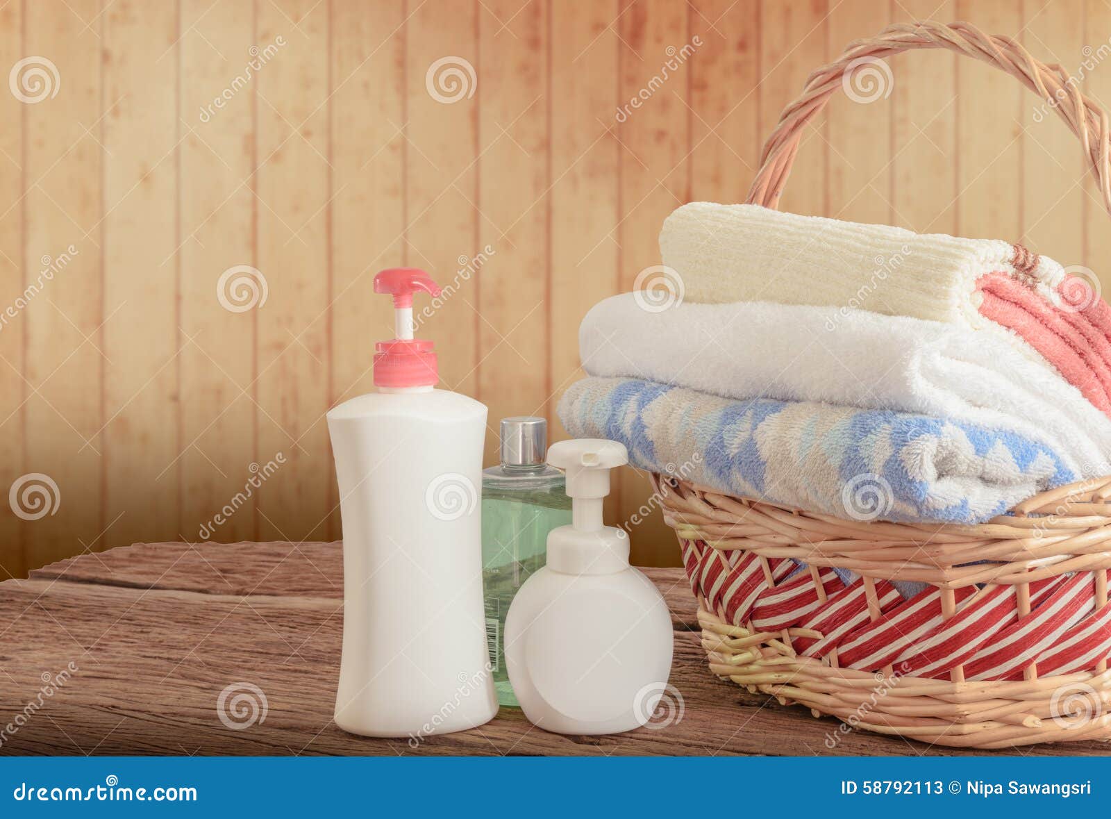 Shower Gel with Skin Cream and Bath Towels in Basket Stock Image ...