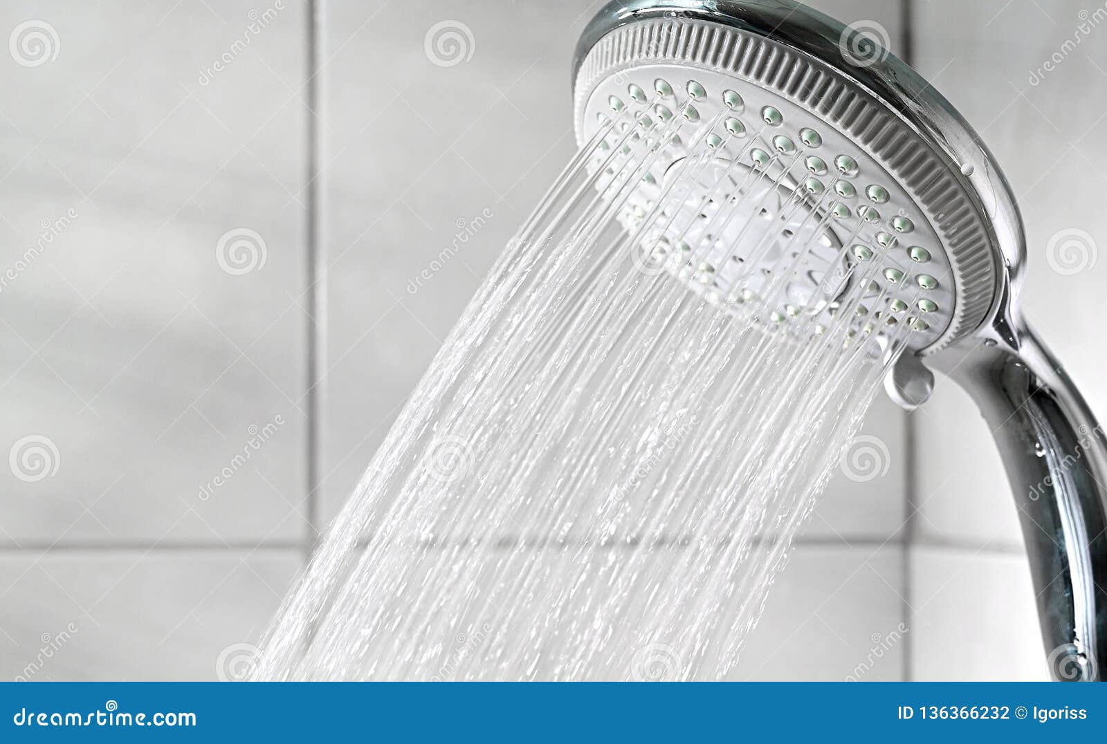 Shower Head and Water Drops in the White Bathroom Stock Photo Image