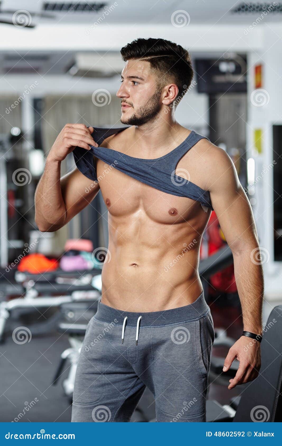 Showing off abs stock photo. Image of lifestyle, body 48602592
