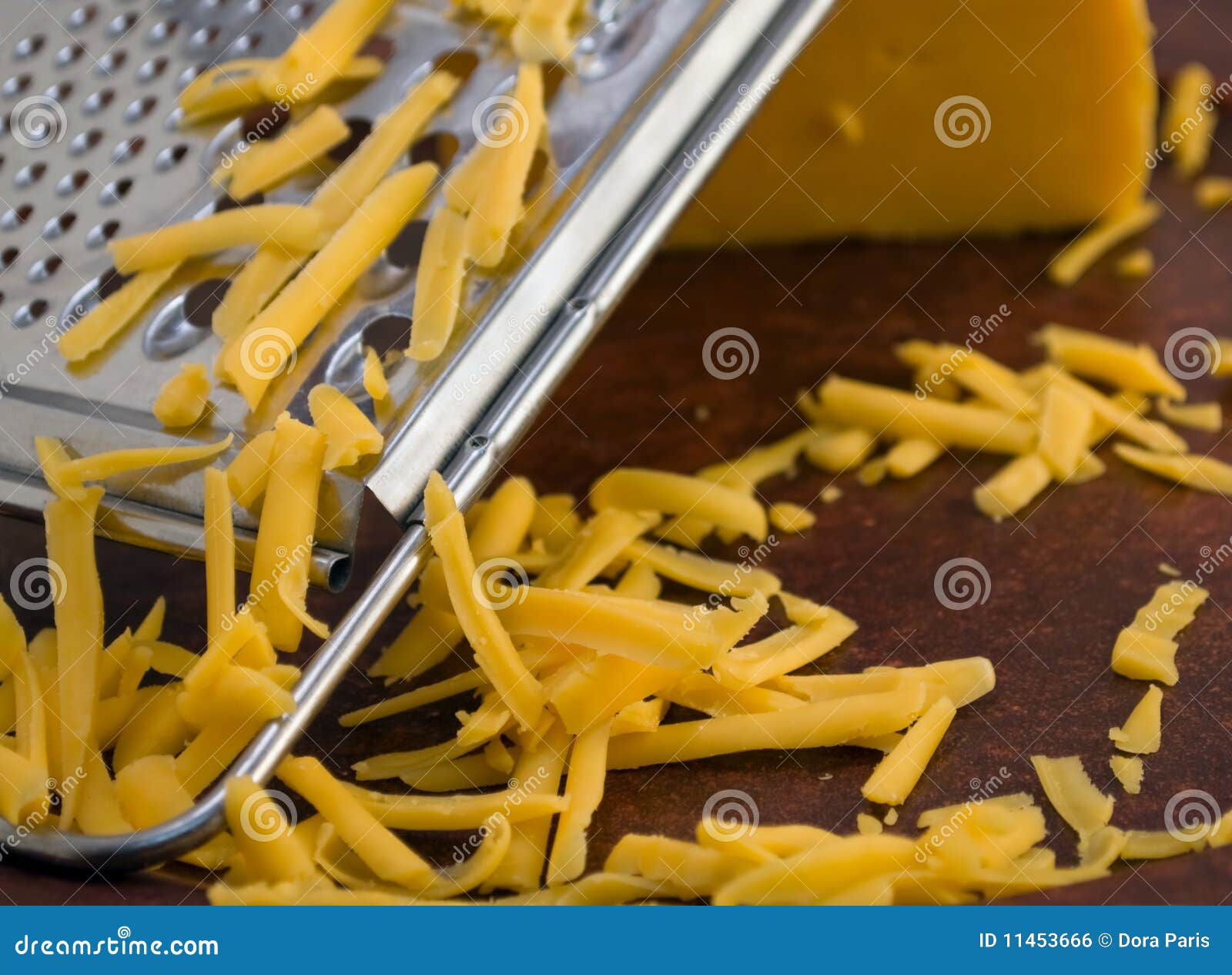 Shredded cheddar stock photo. Image of tool, orange, kitchen - 11453666