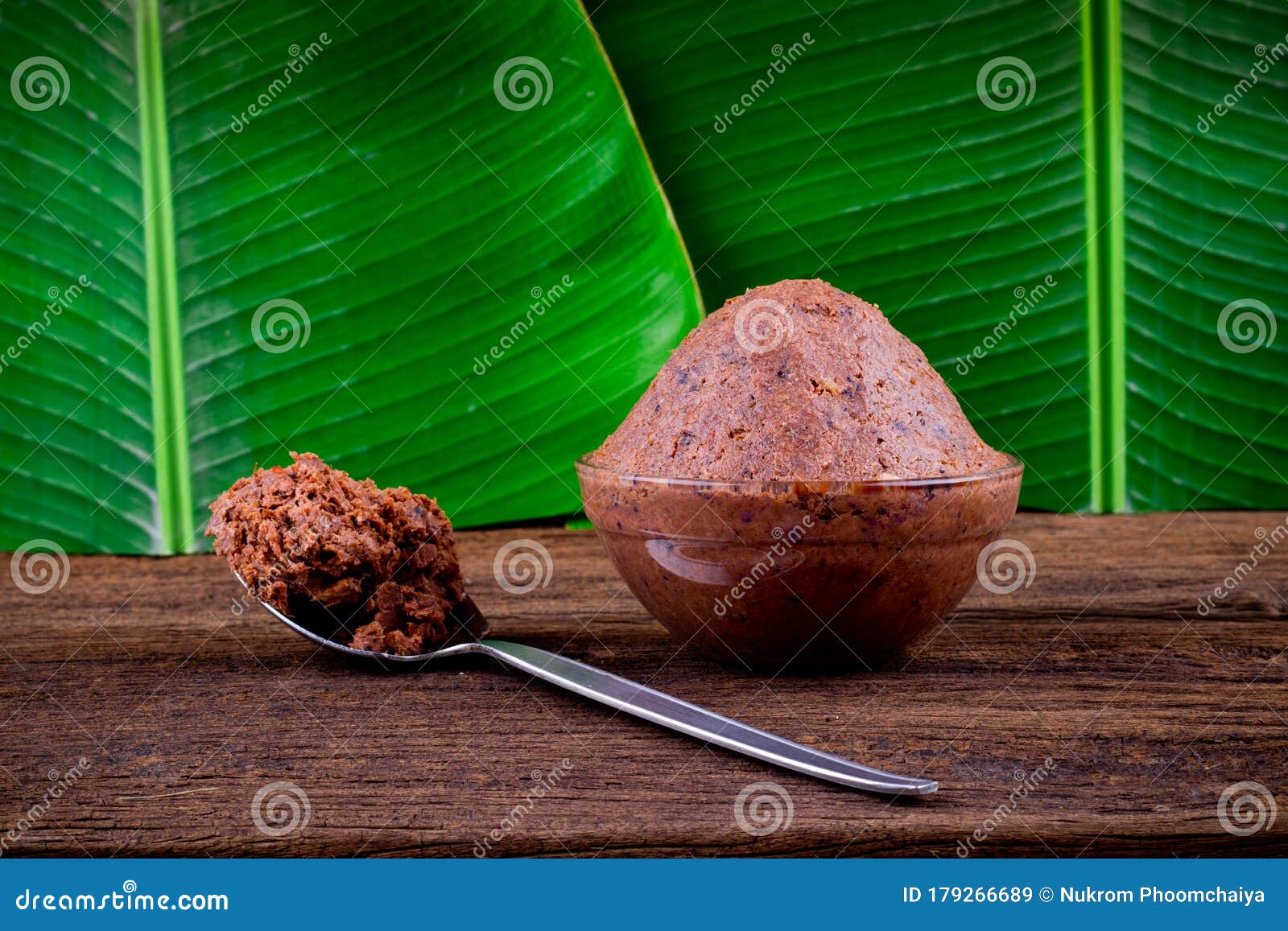 shrimp paste kapi on brown wood and banana leaf backgroundn