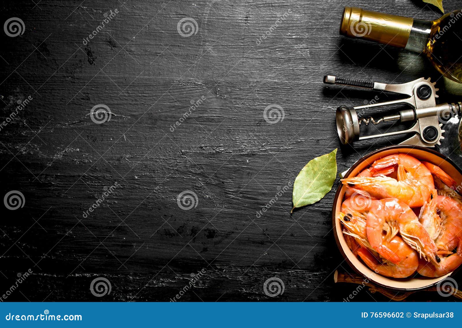 Shrimp with White Wine and a Corkscrew. Stock Photo Image of food
