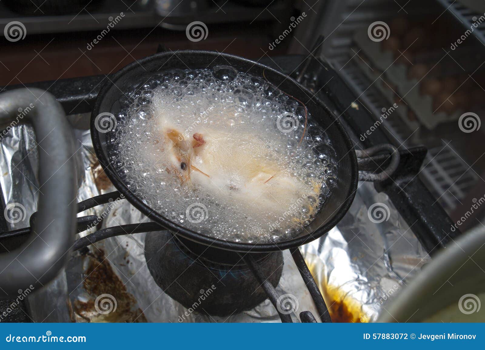 shrimps boil in metallic bowl