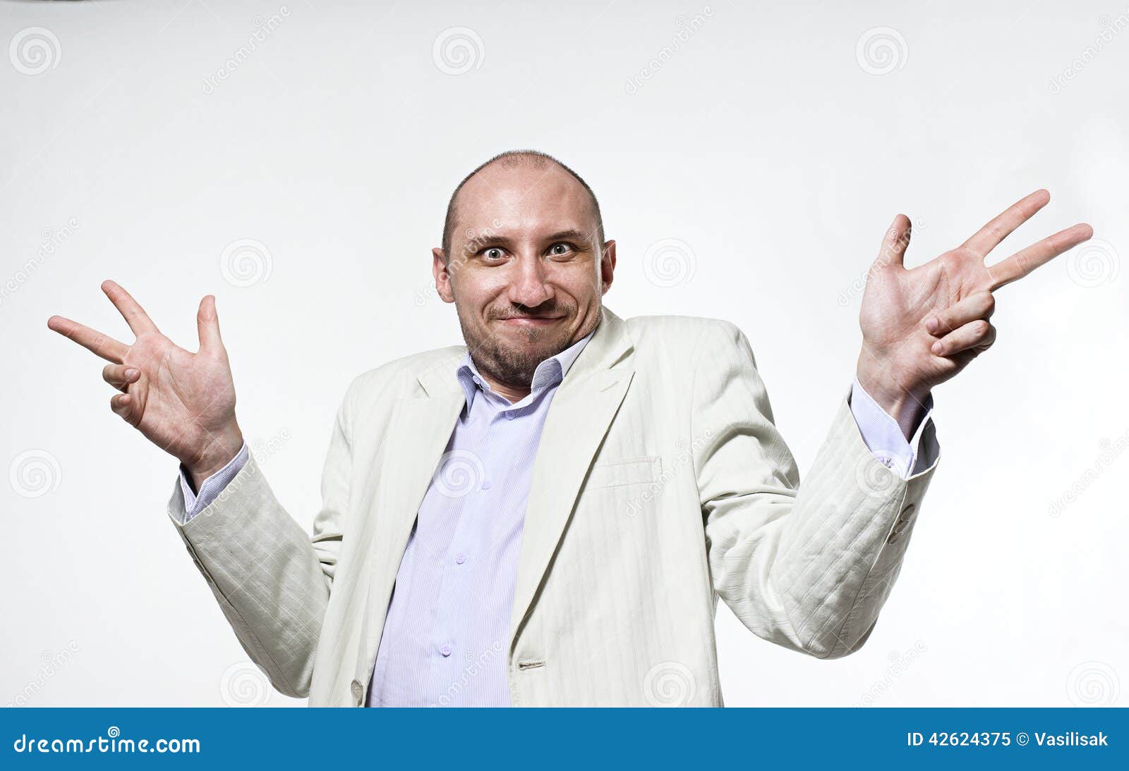 shrugging man in doubt and surprise doing shrug showing open palms