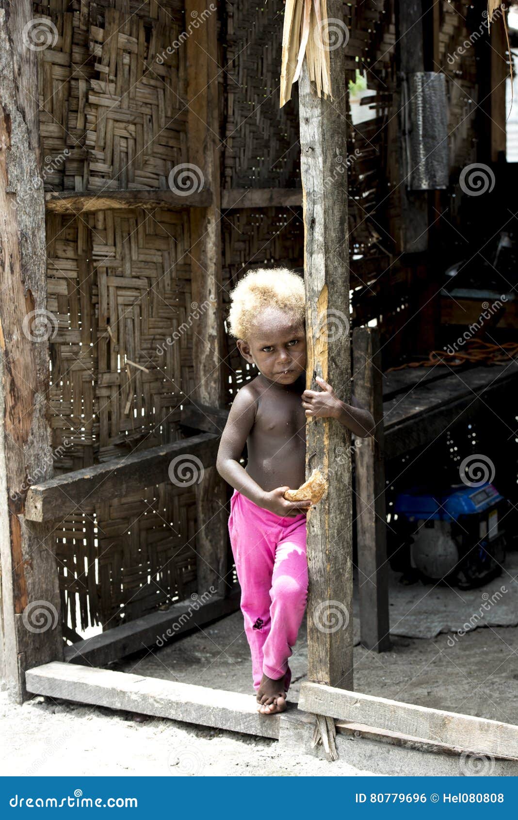 Shy Blonde Baby Girl In Handmade House Solomon Islands Editorial
