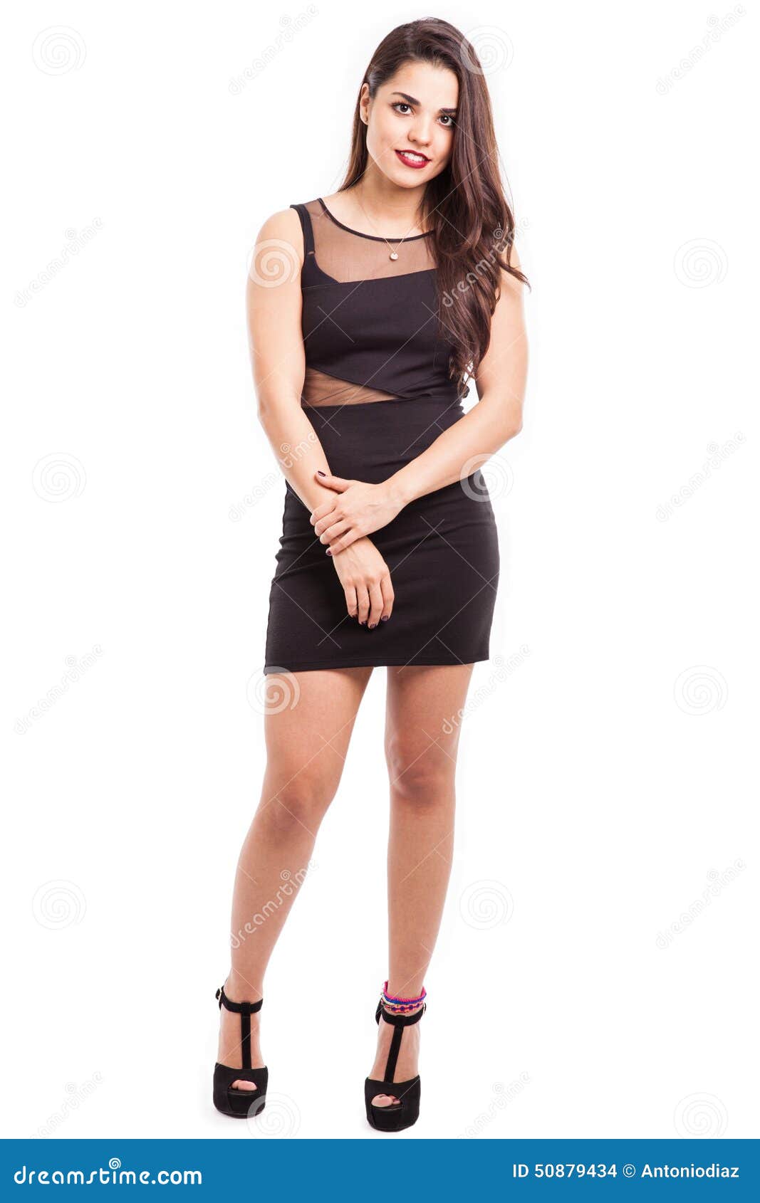 Shy young woman in a dress stock photo. Image of length - 50879434