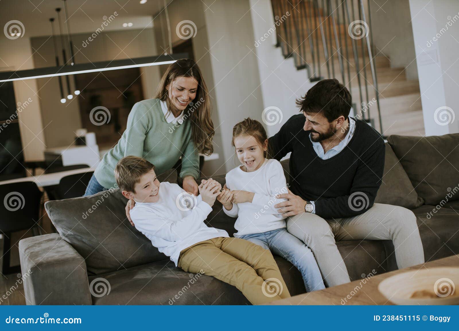 Siblings Fighting Over Tv Remote Control At Home Stock Image Image Of Living Female 238451115