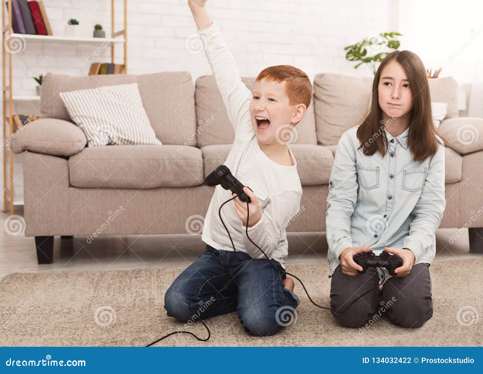 girl and boy playing video games