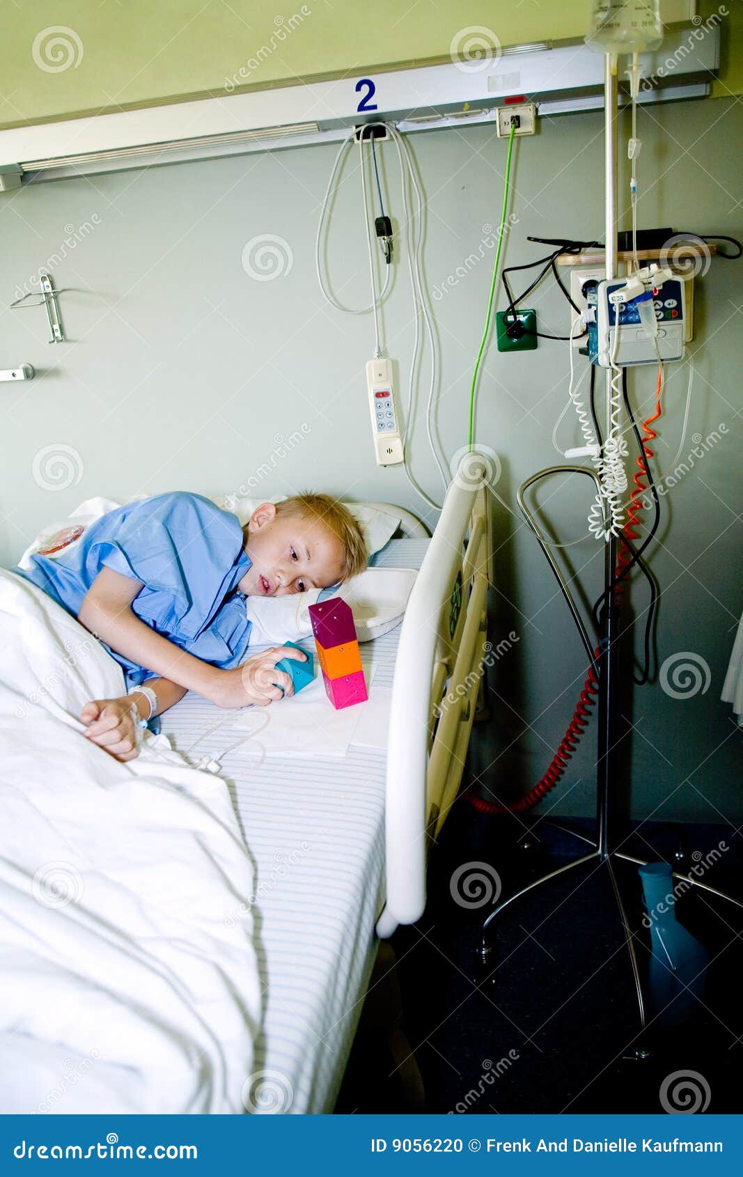Sick Boy In Hospital Bed With His Toy Stock Photo Image 9056220