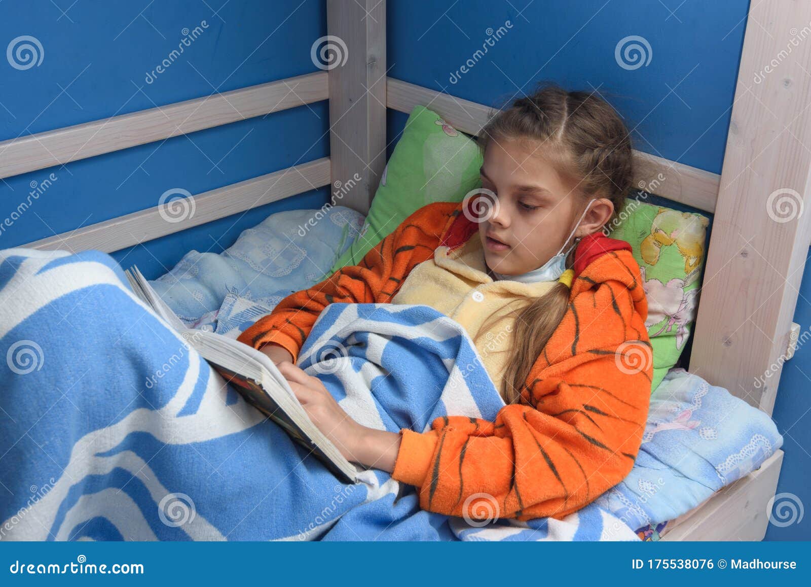Sick Girl Reads a Book Lying in Bed in Bed Stock Photo Image of face