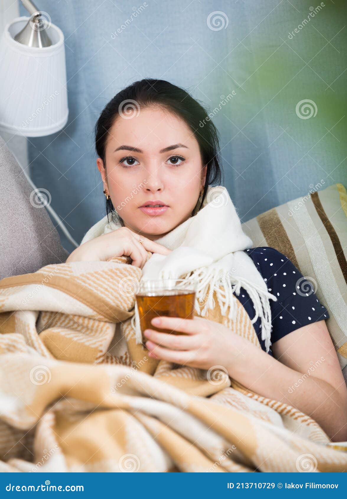 Sick girl under blanket stock image. Image of indisposition 213710729