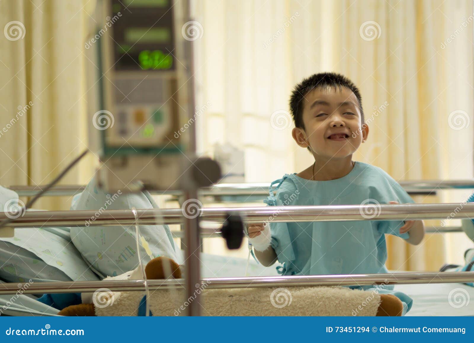 A Sick Little Boy in Hospital Bed. Stock Photo Image of person, lying