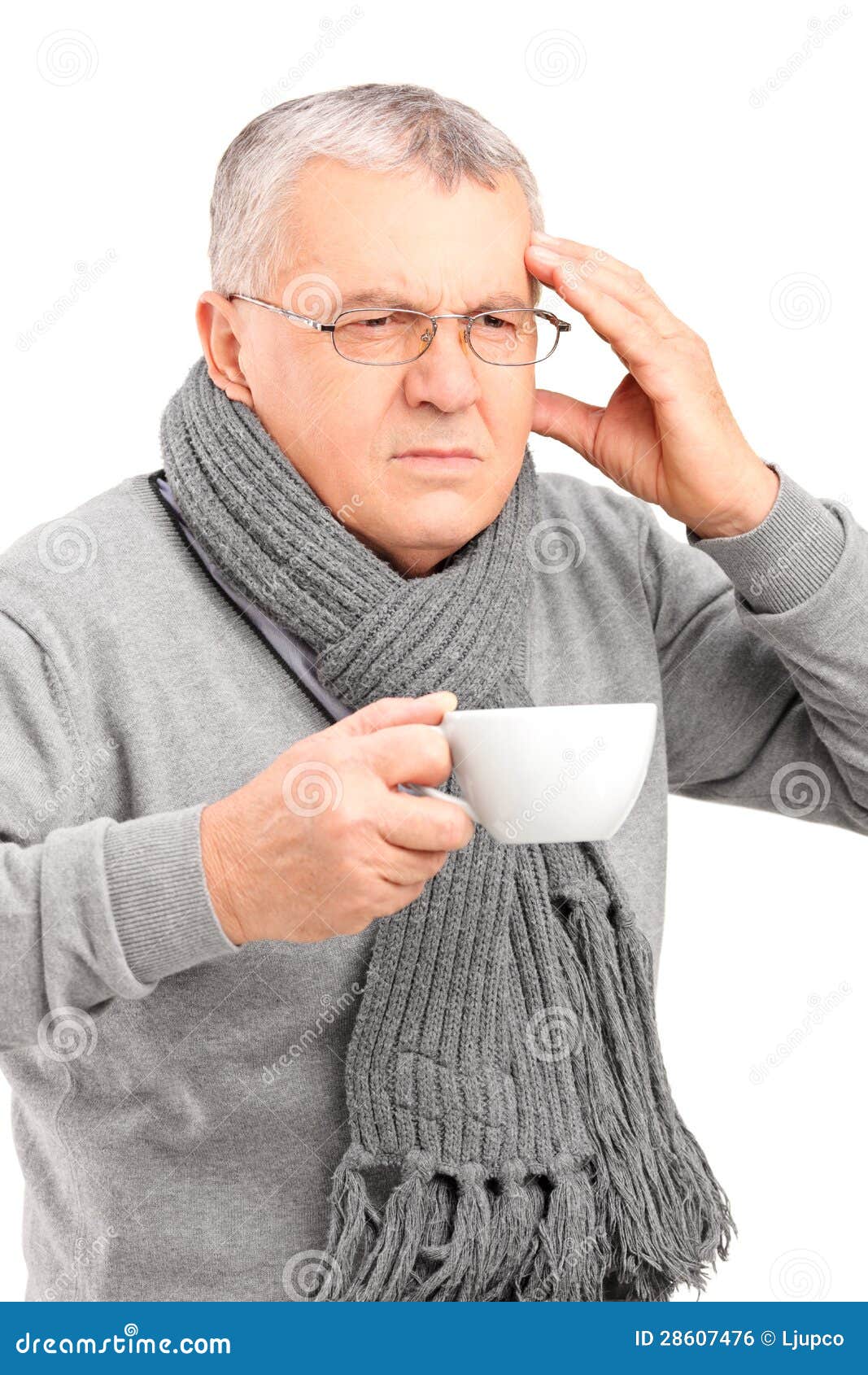 Sick Mature Man Holding A Cup Of Tea And Gesturing ...