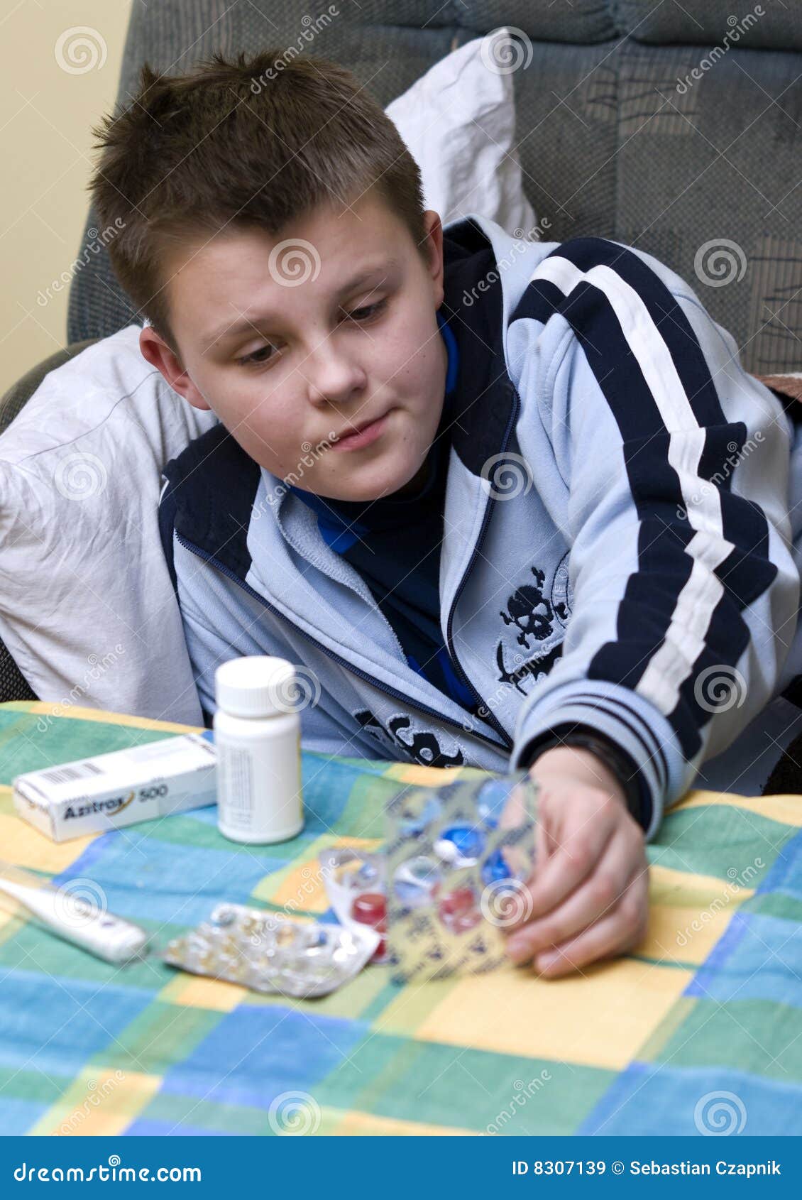 Sick Teenage Boy and Medicines Stock Image - Image of lying, rest: 8307139