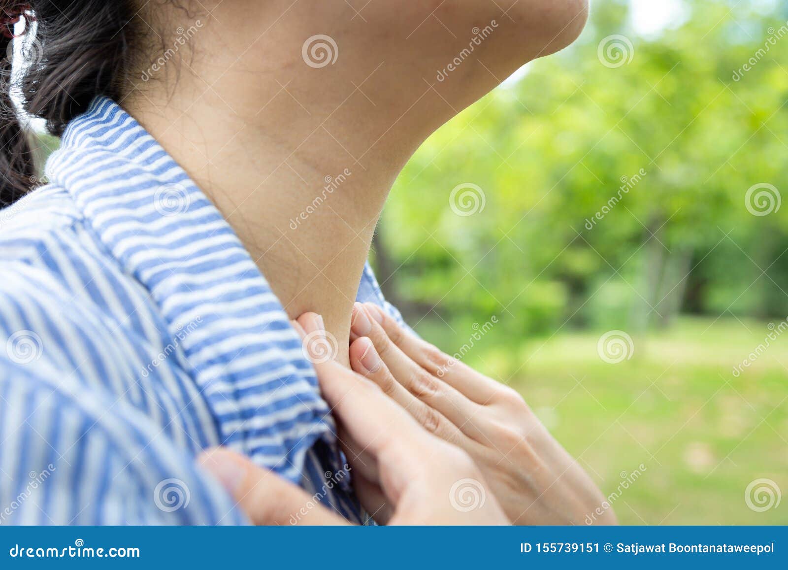 sick woman suffering from sore throat,painful swallowing,tonsillitis,irritation,asian female patient checking thyroid gland by