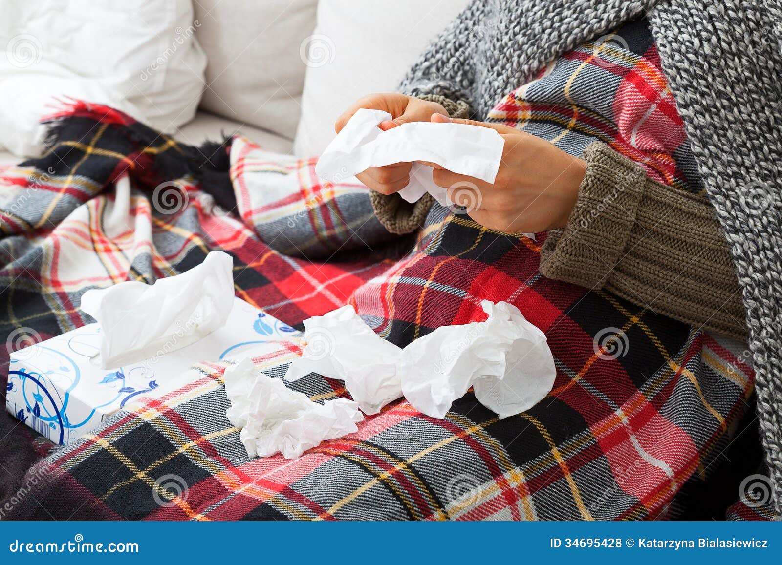 sick woman with tissues