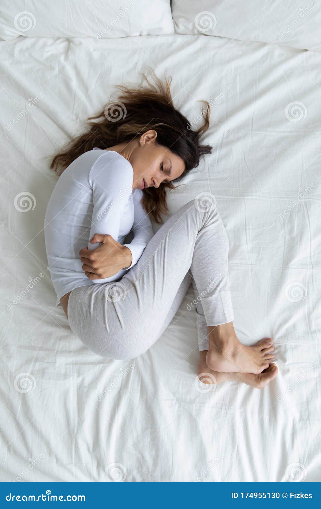 sick young woman touch belly suffer from stomach ache