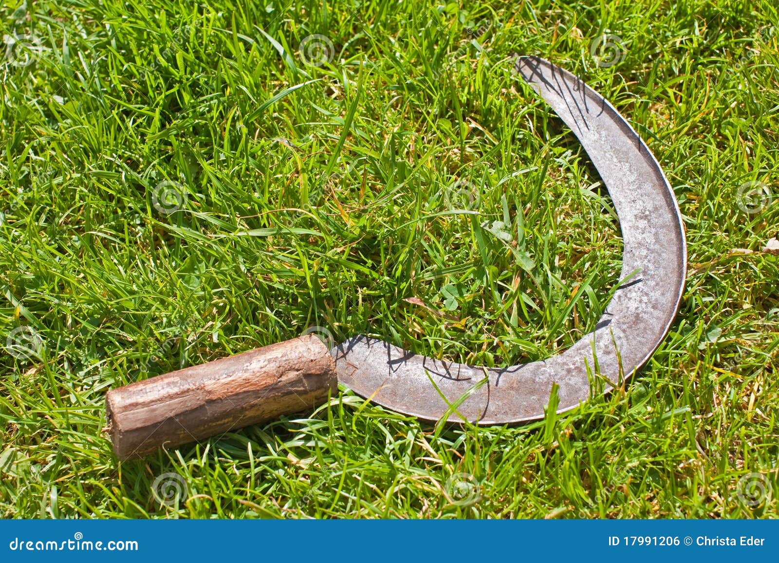 Image of Traditional sickle grass cutter