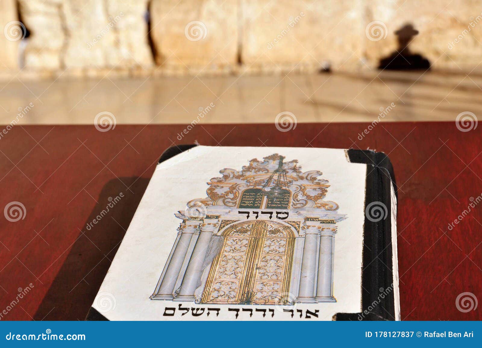 siddur book against the western wailing  kotel wall in jerusalem old city israel