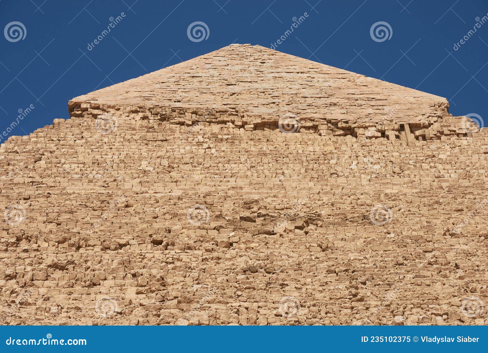side and faced top of  pyramid of khafre also read as khafra, khefren or of chephren is the second-tallest and second-largest of