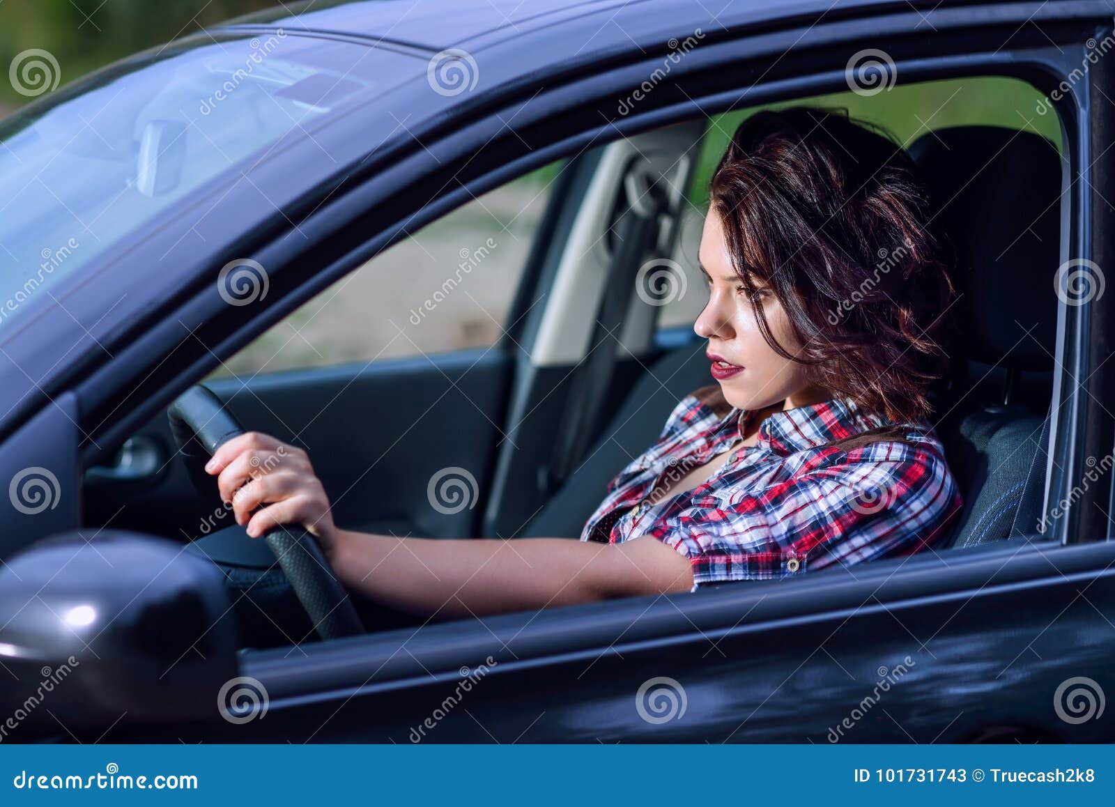 Side Portrait of Young Woman Driving a Car on High Speed Stock Image ...