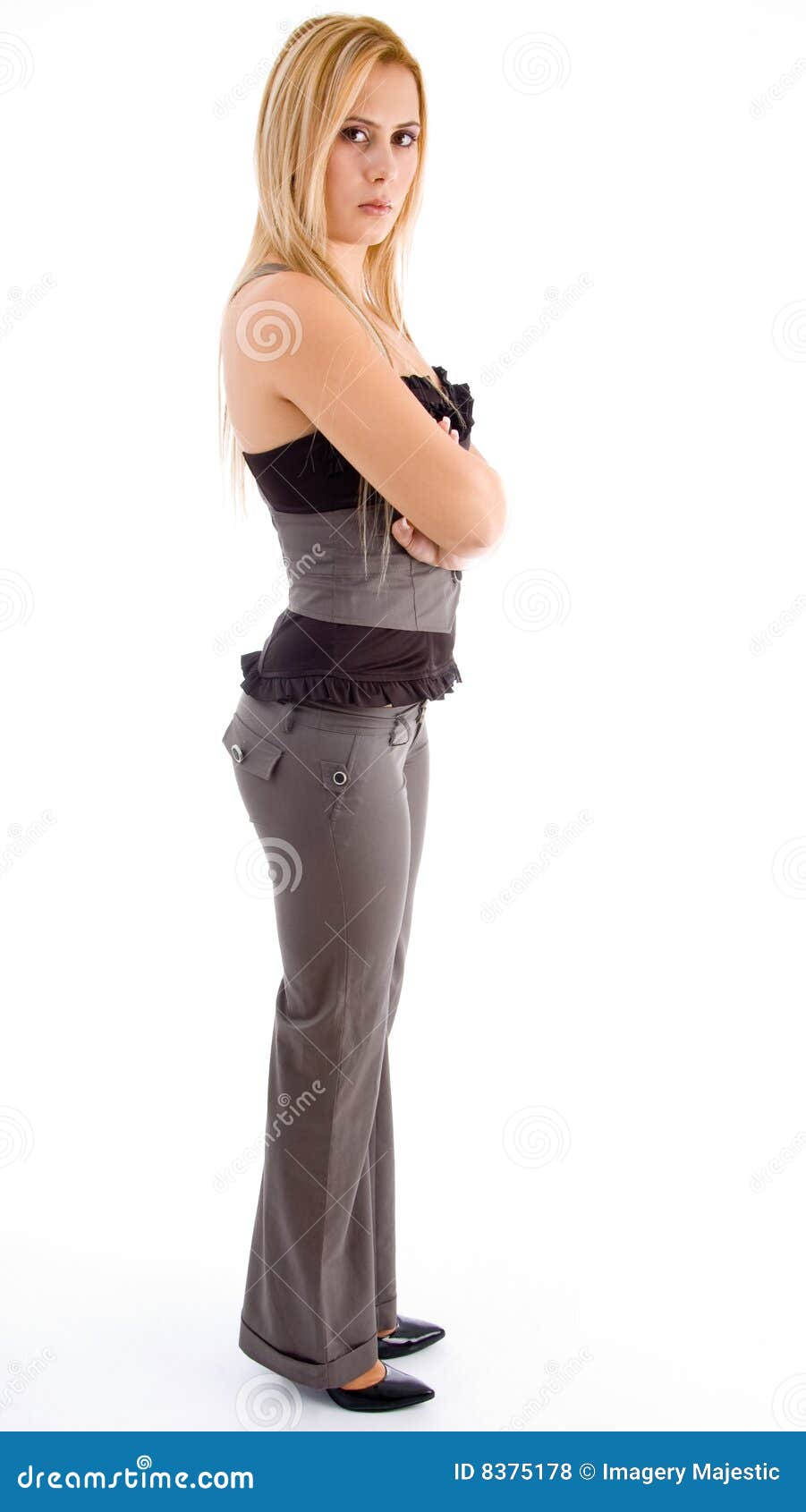 Side Pose Young Woman Posing With Folded Arms Stock Photo, Picture and  Royalty Free Image. Image 39513898.