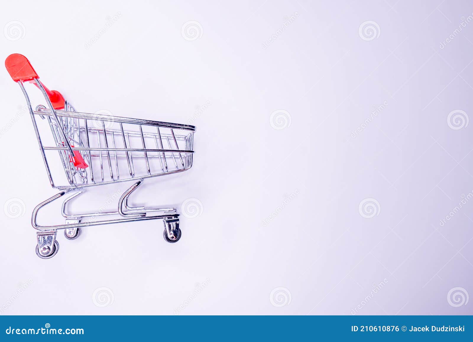 Side Profile Half Turned Close Up View Photo of Tiny Small Silver and Red Metallic with Wheels