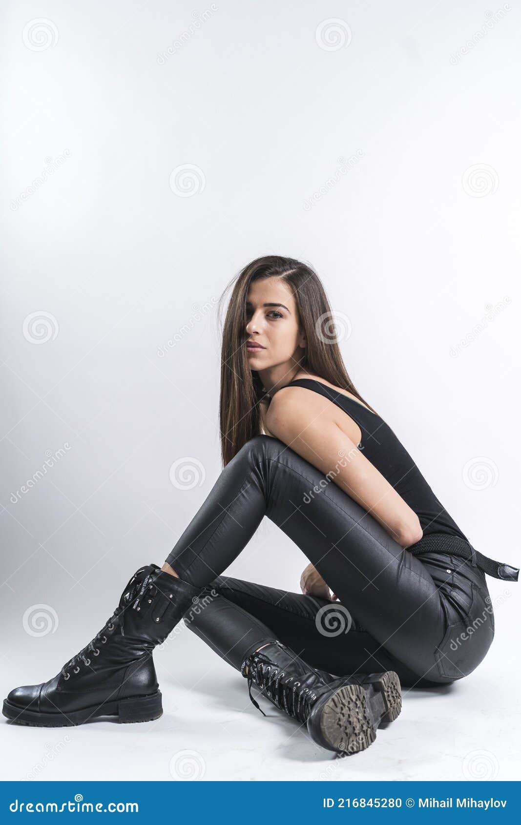 Beautiful girl in black leather pants. Stock Photo by ©kopitin 87165588