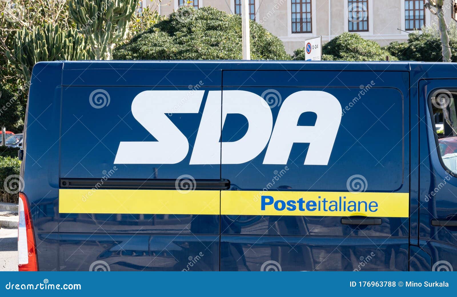 The Side View Of A Blue Post Office Van Of The SDA Posta Italiane ...