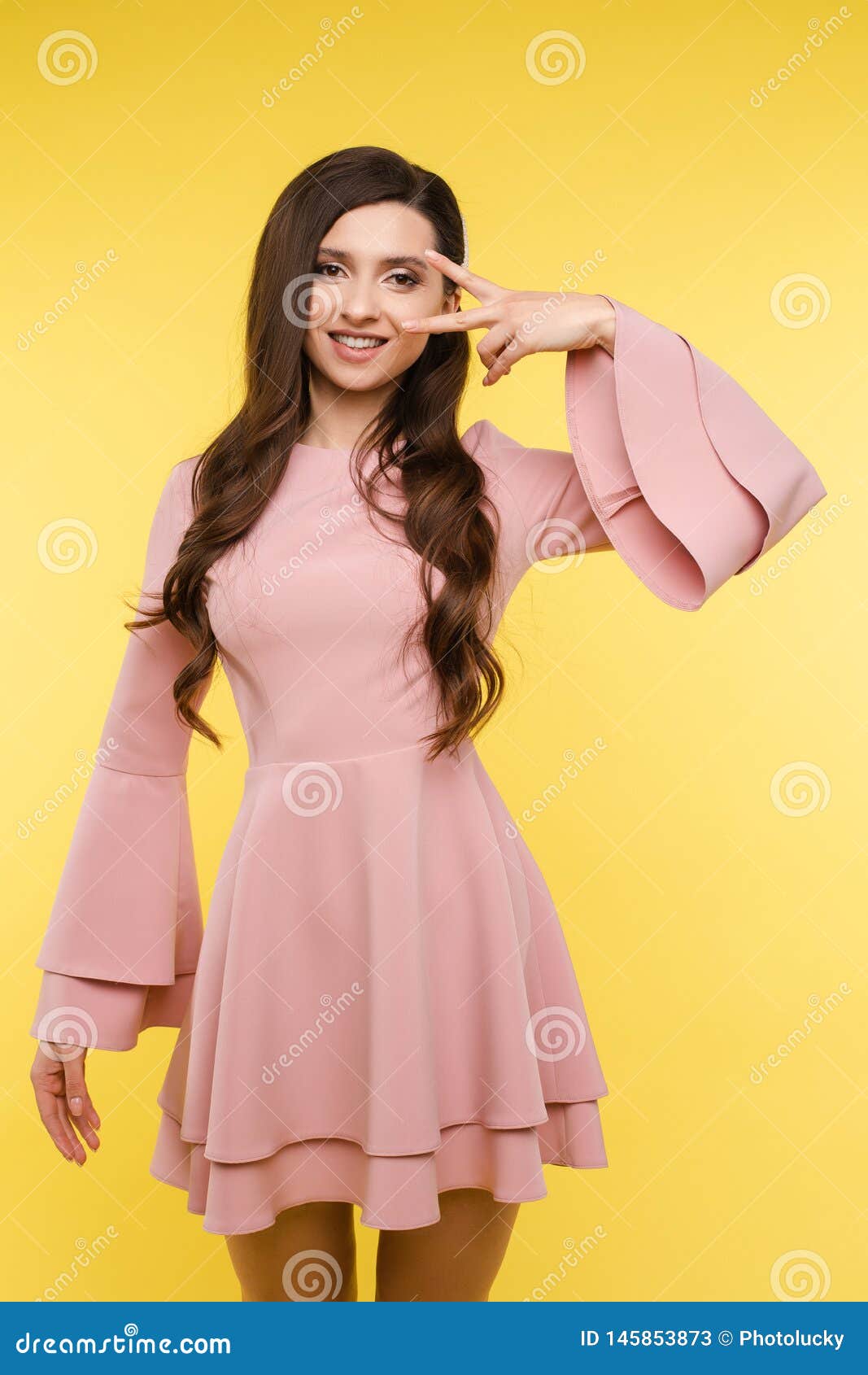 Little beautiful girl wearing casual clothes looking to side, relax profile  pose with natural face with confident smile Stock Photo - Alamy