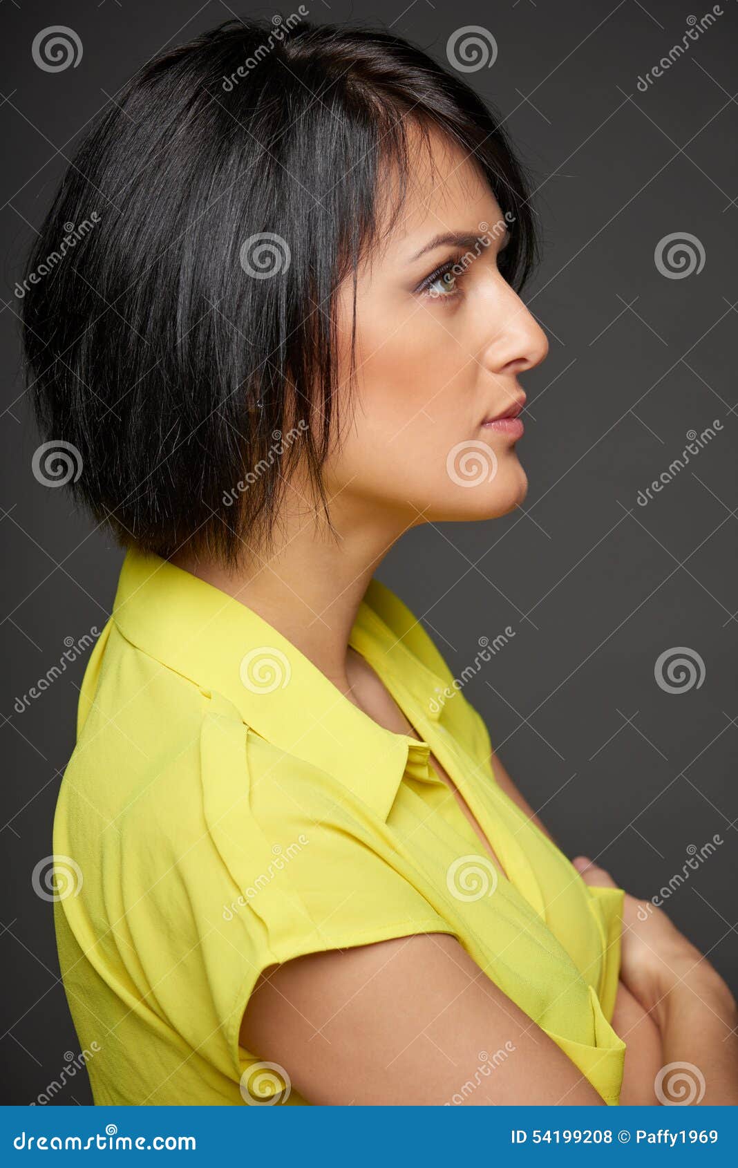 side view of business woman looking forward