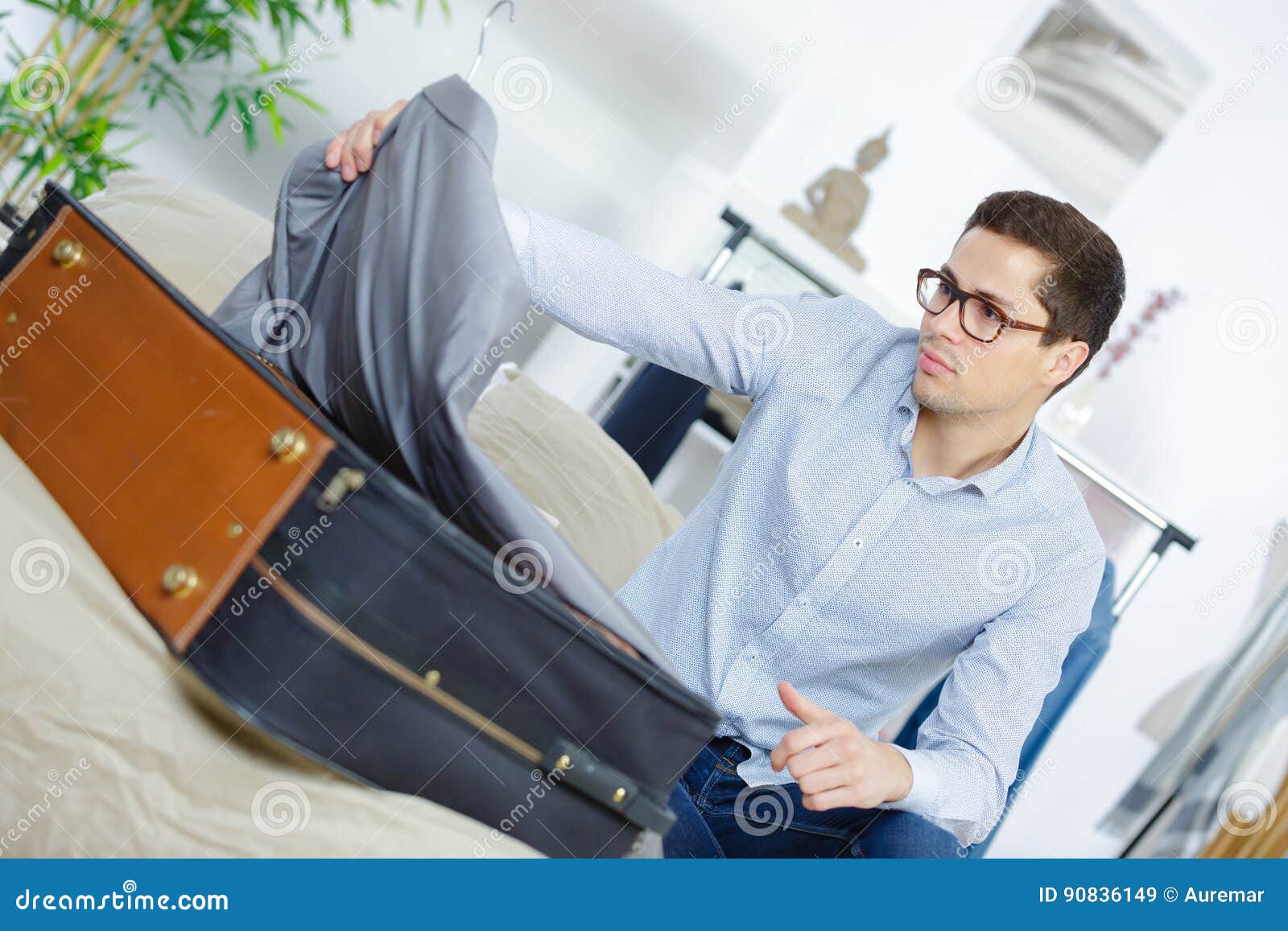 Side View Businessman Unpacking Luggage at Hotel Stock Image Image of