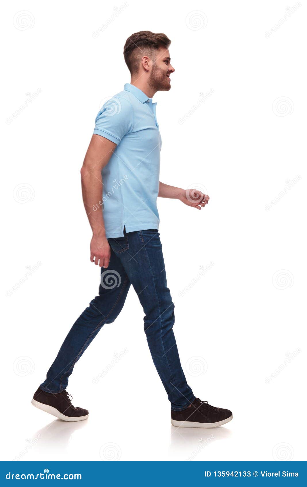 Side View of Casual Man in Blue Polo Shirt Walking Stock Image - Image ...