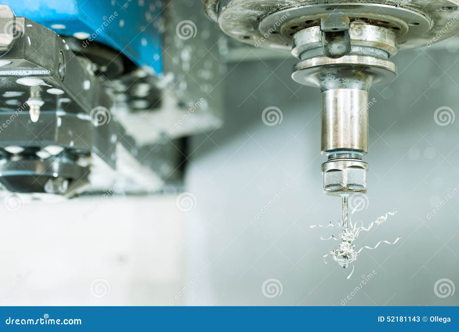 Side View on CNC Milling Machine Drill with Metal Shaving Scrap Stock