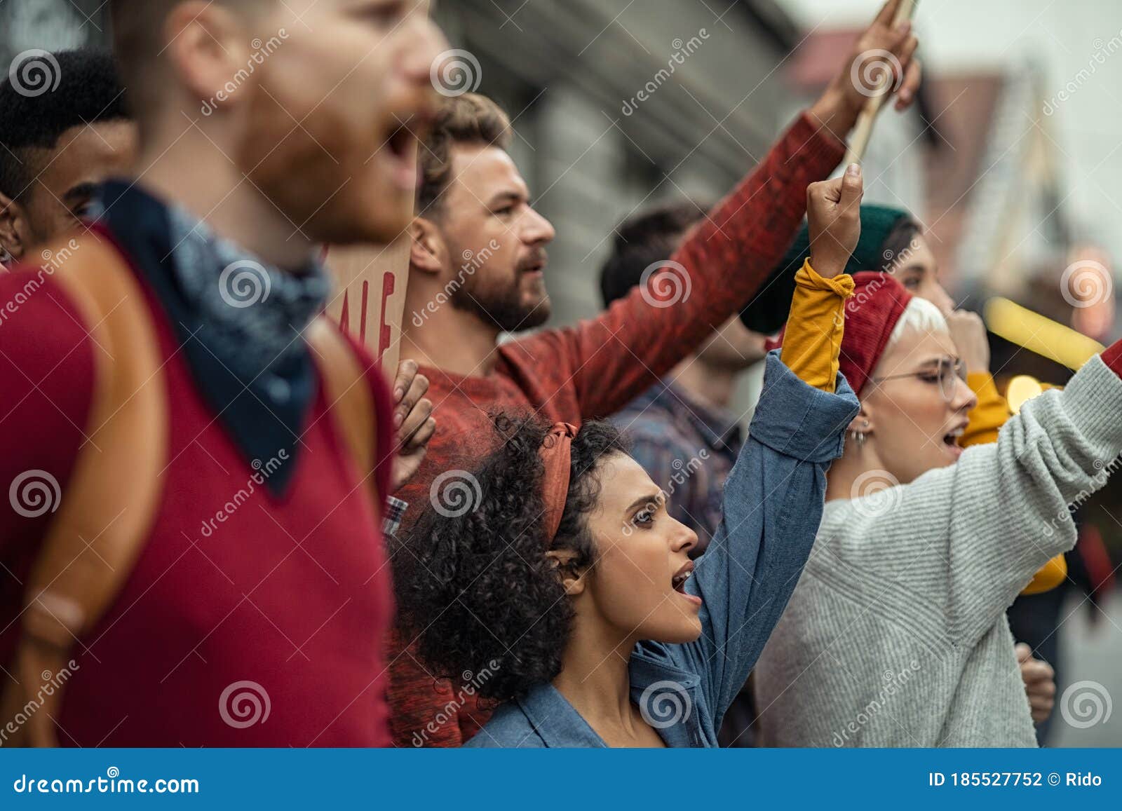 group of people in rally protesting