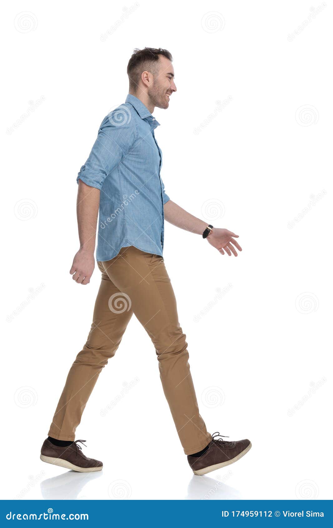 Side View of Happy Casual Man Laughing and Stepping Stock Photo - Image ...