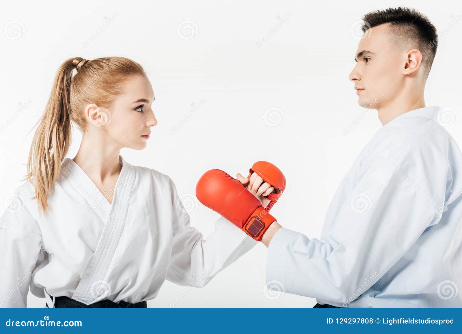 Side View of Karate Fighters Touching with Gloves Stock Photo Image of girl, sport 129297808