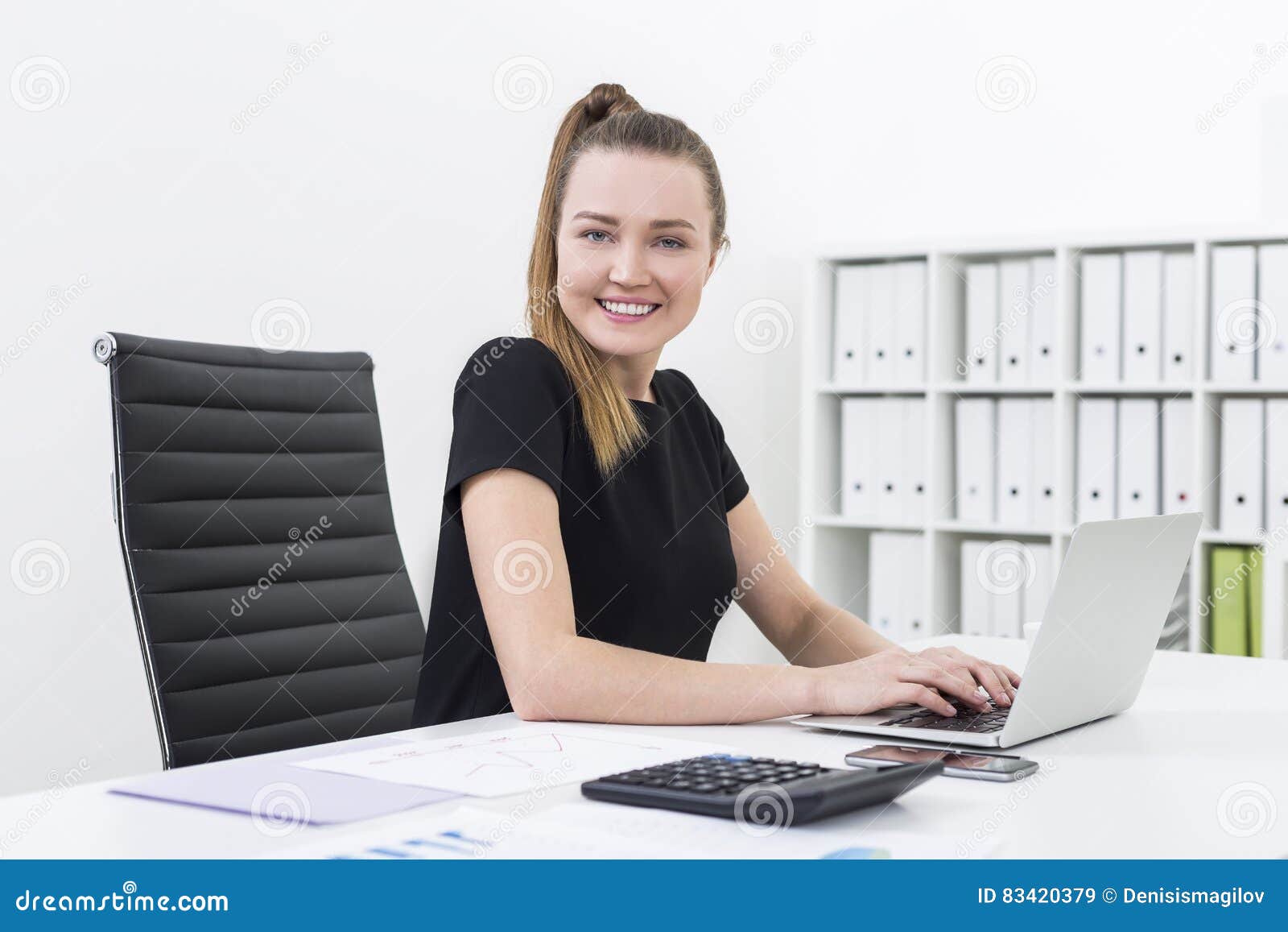 Side View of an Office Clerk Typing and Smiling Stock Image Image of