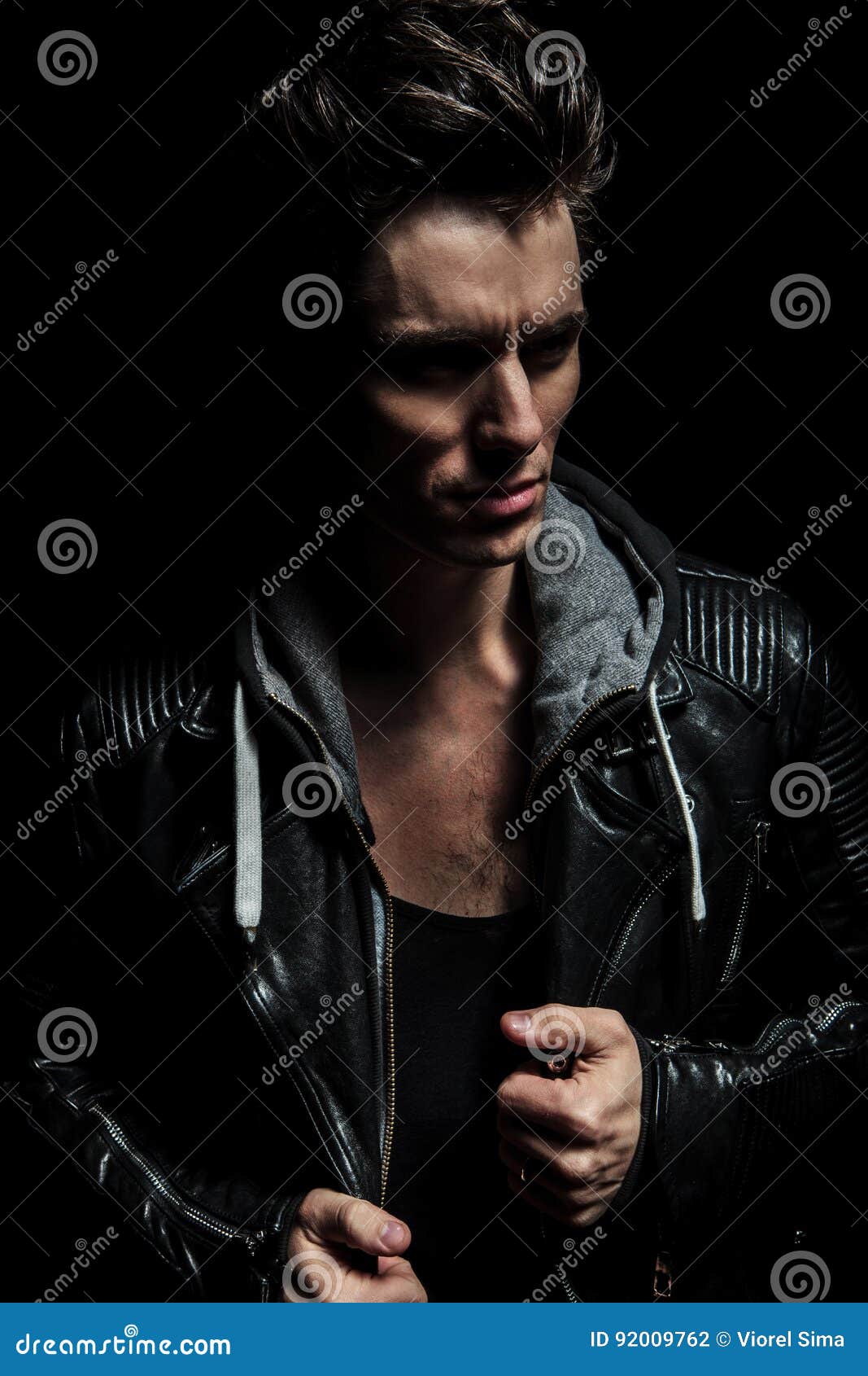 Side View Portrait of a Dramatic Man in Leather Jacket Stock Photo ...