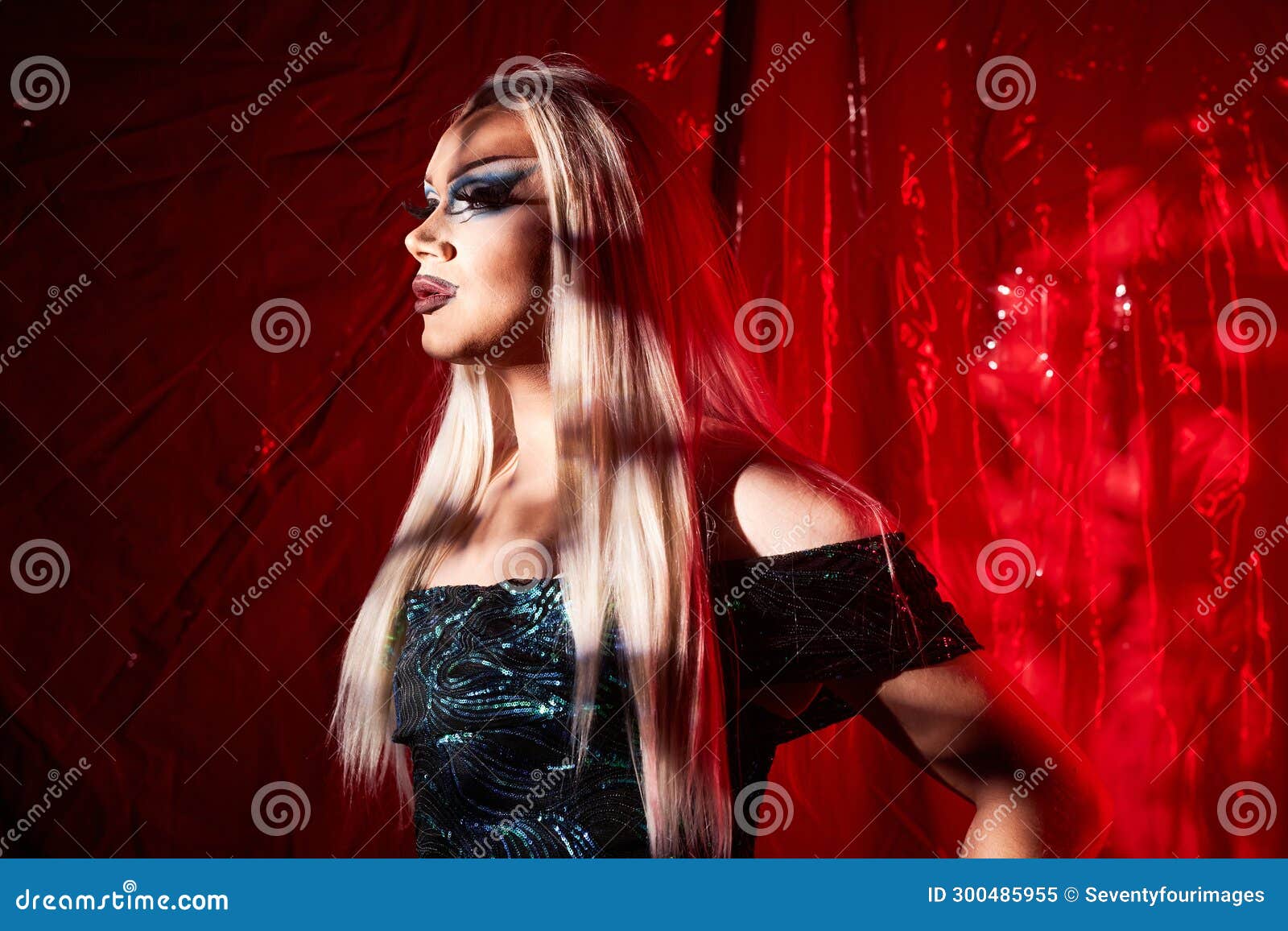 drag queen standing on stage