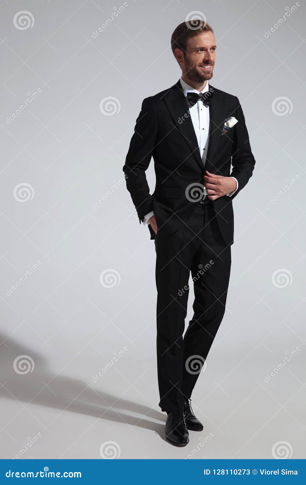 Side View of a R Man in Tuxedo Holding His Button Stock Image - Image ...