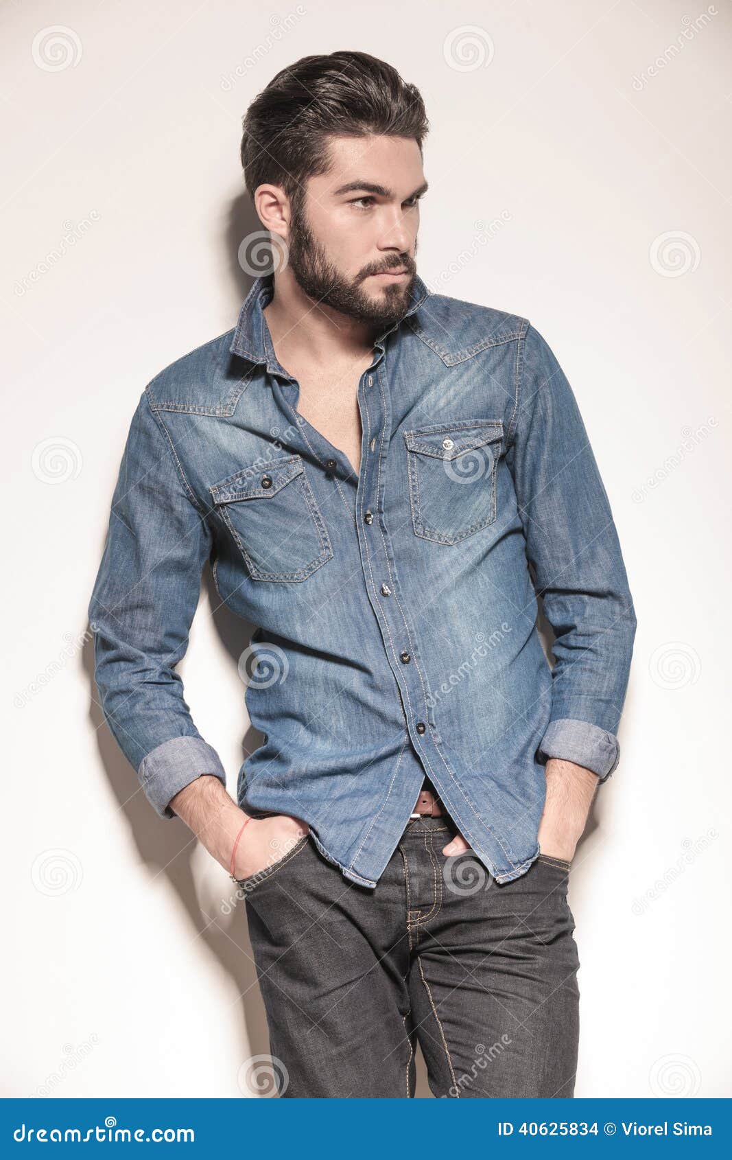 Side View of a Relaxed Young Man in Jeans Clothes Stock Photo - Image ...
