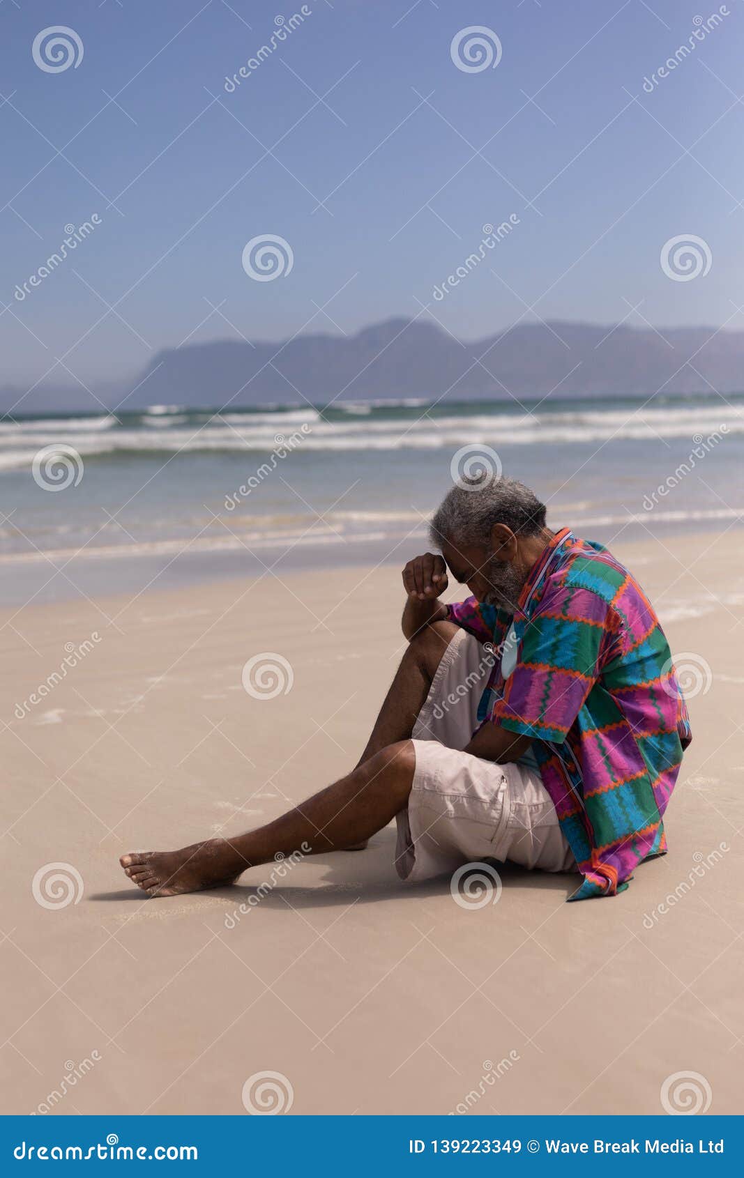 Thinking Man Sitting Alone On Sea Beach feeling alone and sad 5254986 Stock  Photo at Vecteezy